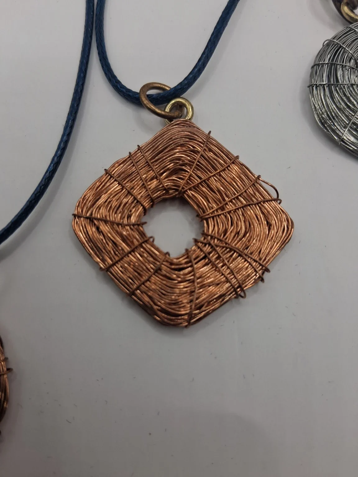 Hand-wound Designs By J copper jewelry
